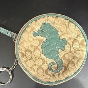 Coach Tan and Green Seahorse Wristlet